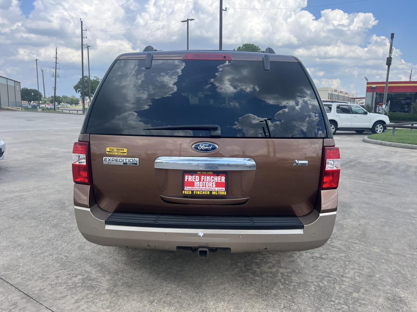 2011 Brown Ford Expedition EL King Ranch 2WD (1FMJK1H5XBE) with an 5.4L V8 SOHC 16V FFV engine, 6-Speed Automatic transmission, located at 14700 Tomball Parkway 249, Houston, TX, 77086, (281) 444-2200, 29.928619, -95.504074 - Photo#5