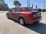 2010 Orange Subaru Impreza 2.5i Premium 4-Door (JF1GE6B60AH) with an 2.5L H4 SOHC 16V engine, Auto transmission, located at 14700 Tomball Parkway 249, Houston, TX, 77086, (281) 444-2200, 29.928619, -95.504074 - Photo#4