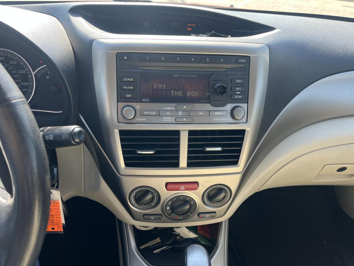 2010 Orange Subaru Impreza 2.5i Premium 4-Door (JF1GE6B60AH) with an 2.5L H4 SOHC 16V engine, Auto transmission, located at 14700 Tomball Parkway 249, Houston, TX, 77086, (281) 444-2200, 29.928619, -95.504074 - Photo#14