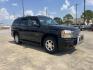 2004 Black /Gray GMC Yukon Denali Base (1GKEK63U04J) with an 6.0L V8 OHV 16V engine, 4-Speed Automatic Overdrive transmission, located at 14700 Tomball Parkway 249, Houston, TX, 77086, (281) 444-2200, 29.928619, -95.504074 - Photo#0