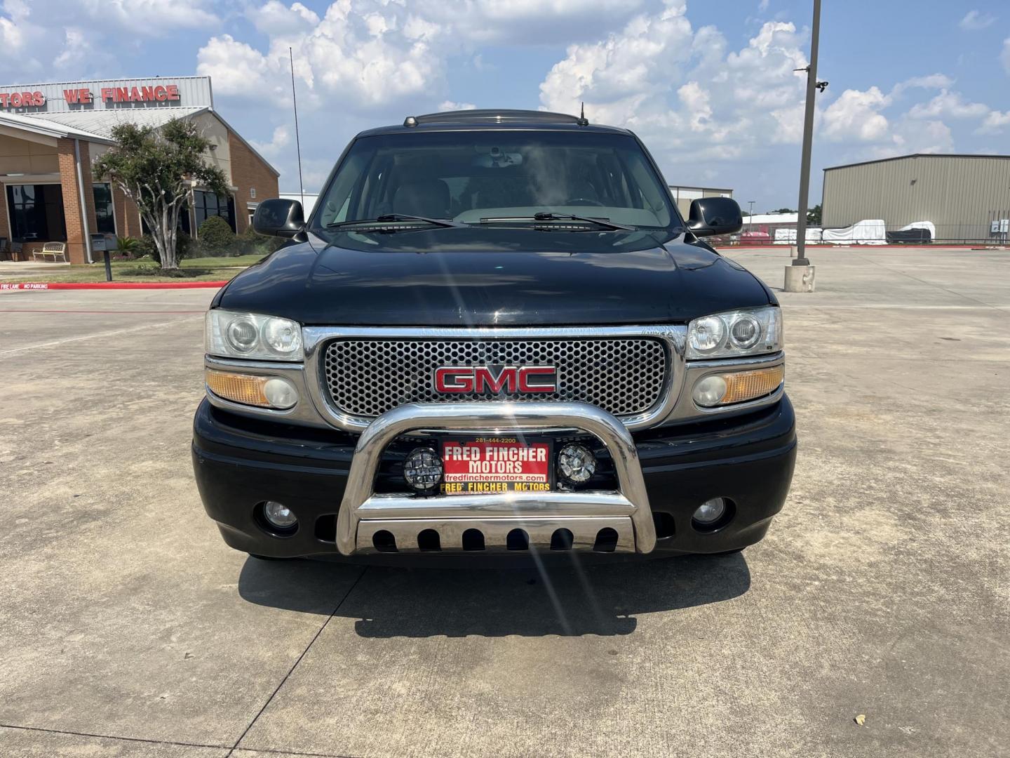 2004 Black /Gray GMC Yukon Denali Base (1GKEK63U04J) with an 6.0L V8 OHV 16V engine, 4-Speed Automatic Overdrive transmission, located at 14700 Tomball Parkway 249, Houston, TX, 77086, (281) 444-2200, 29.928619, -95.504074 - Photo#1