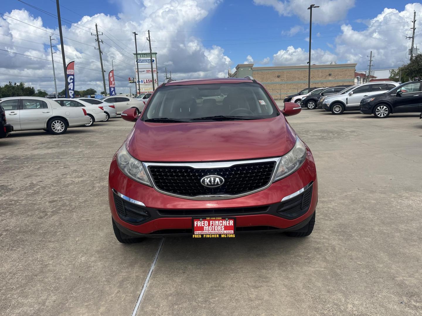 2014 red Kia Sportage LX AWD (KNDPBCAC3E7) with an 2.4L V6 DOHC 24V engine, 6-Speed Automatic transmission, located at 14700 Tomball Parkway 249, Houston, TX, 77086, (281) 444-2200, 29.928619, -95.504074 - Photo#1
