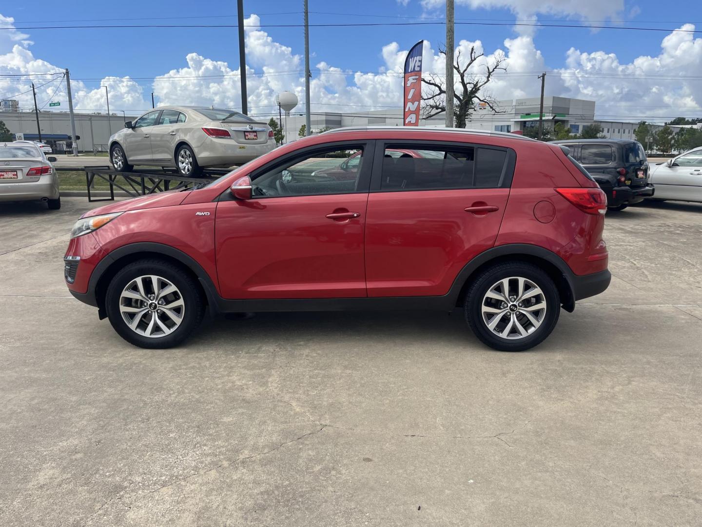 2014 red Kia Sportage LX AWD (KNDPBCAC3E7) with an 2.4L V6 DOHC 24V engine, 6-Speed Automatic transmission, located at 14700 Tomball Parkway 249, Houston, TX, 77086, (281) 444-2200, 29.928619, -95.504074 - Photo#3