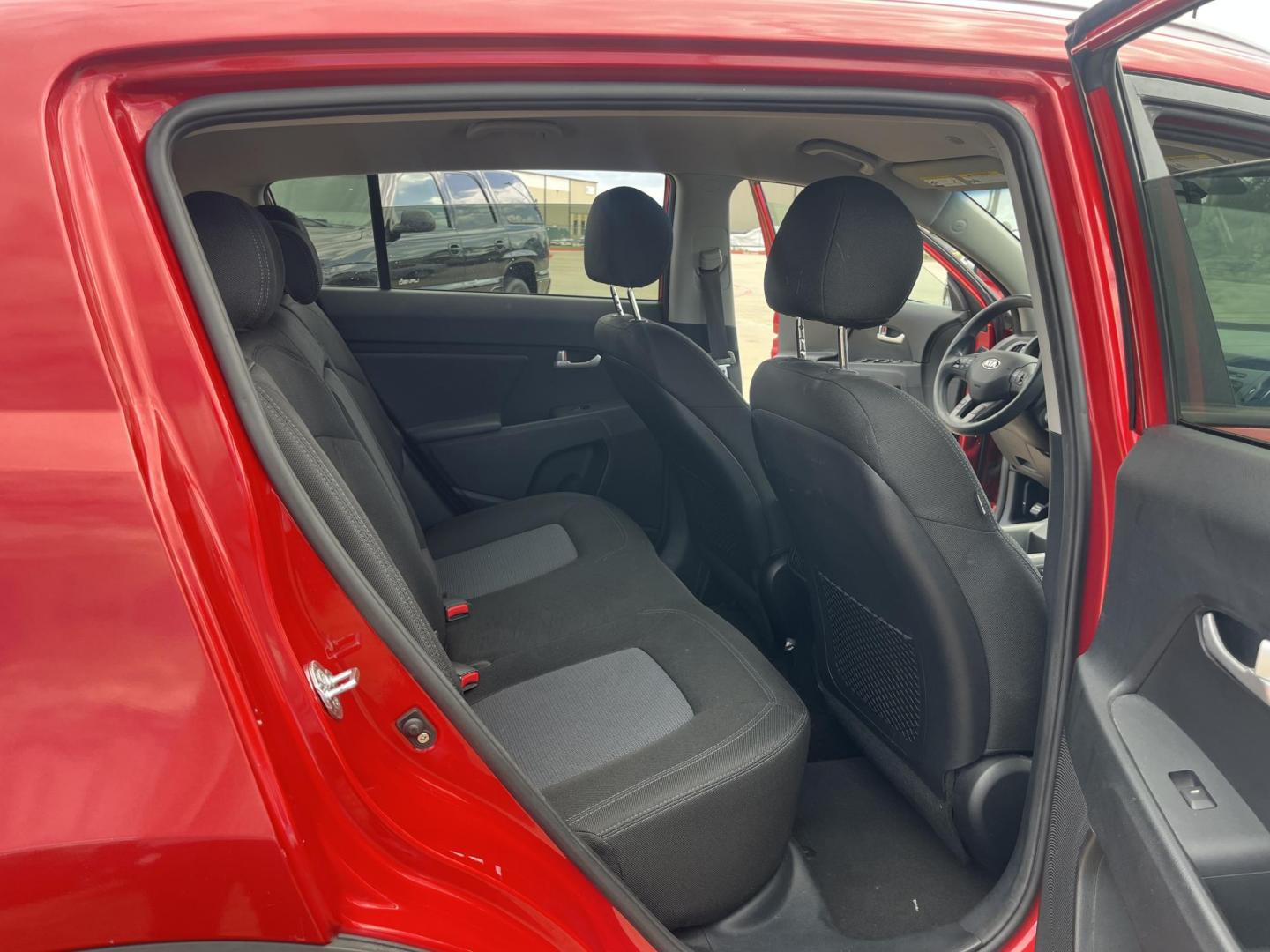 2014 red Kia Sportage LX AWD (KNDPBCAC3E7) with an 2.4L V6 DOHC 24V engine, 6-Speed Automatic transmission, located at 14700 Tomball Parkway 249, Houston, TX, 77086, (281) 444-2200, 29.928619, -95.504074 - Photo#12