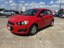 2015 red Chevrolet Sonic LT Auto 5-Door (1G1JC6SH3F4) with an 1.8L L4 DOHC 24V engine, 6-Speed Automatic transmission, located at 14700 Tomball Parkway 249, Houston, TX, 77086, (281) 444-2200, 29.928619, -95.504074 - Photo#2