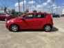 2015 red Chevrolet Sonic LT Auto 5-Door (1G1JC6SH3F4) with an 1.8L L4 DOHC 24V engine, 6-Speed Automatic transmission, located at 14700 Tomball Parkway 249, Houston, TX, 77086, (281) 444-2200, 29.928619, -95.504074 - Photo#3