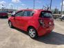 2015 red Chevrolet Sonic LT Auto 5-Door (1G1JC6SH3F4) with an 1.8L L4 DOHC 24V engine, 6-Speed Automatic transmission, located at 14700 Tomball Parkway 249, Houston, TX, 77086, (281) 444-2200, 29.928619, -95.504074 - Photo#4