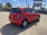 2015 red Chevrolet Sonic LT Auto 5-Door (1G1JC6SH3F4) with an 1.8L L4 DOHC 24V engine, 6-Speed Automatic transmission, located at 14700 Tomball Parkway 249, Houston, TX, 77086, (281) 444-2200, 29.928619, -95.504074 - Photo#6