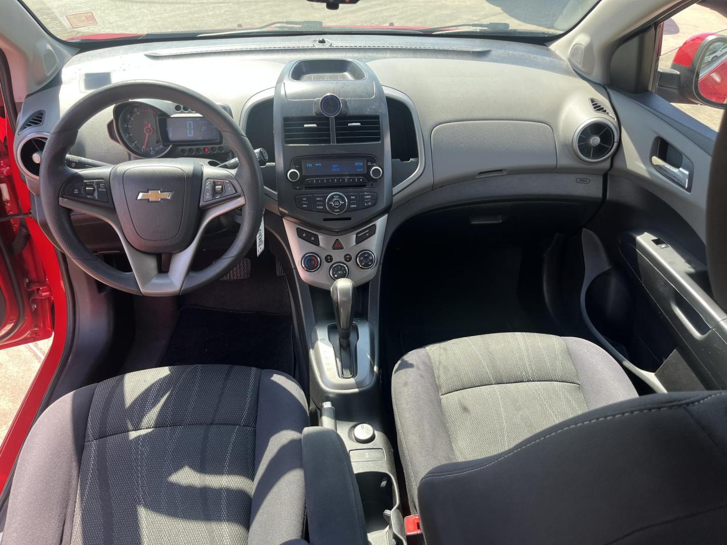 2015 red Chevrolet Sonic LT Auto 5-Door (1G1JC6SH3F4) with an 1.8L L4 DOHC 24V engine, 6-Speed Automatic transmission, located at 14700 Tomball Parkway 249, Houston, TX, 77086, (281) 444-2200, 29.928619, -95.504074 - Photo#10