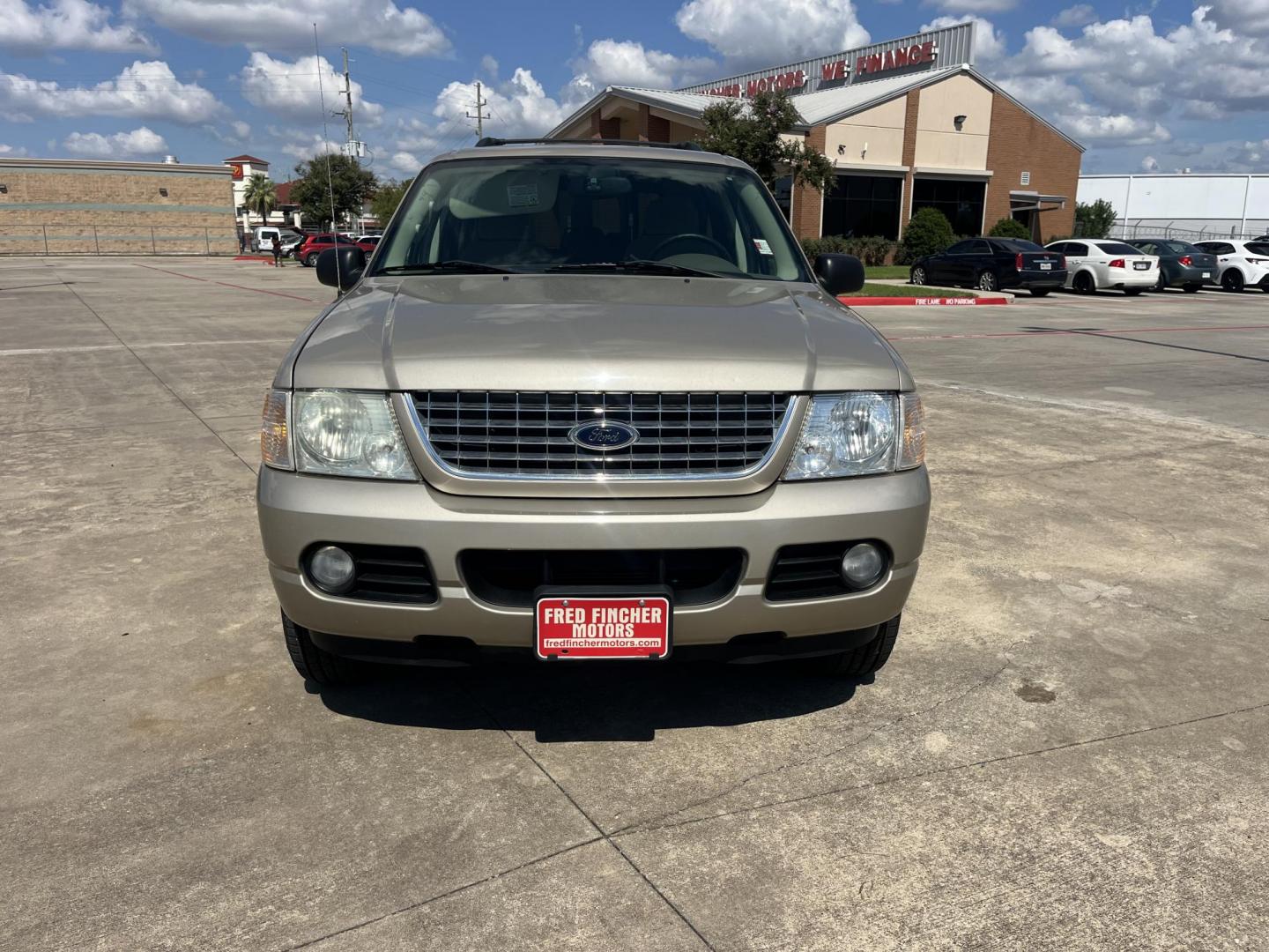2004 GOLD Ford Explorer XLT 4.0L 2WD (1FMZU63K34U) with an 4.0L V6 SOHC 12V FFV engine, 5-Speed Automatic Overdrive transmission, located at 14700 Tomball Parkway 249, Houston, TX, 77086, (281) 444-2200, 29.928619, -95.504074 - Photo#1