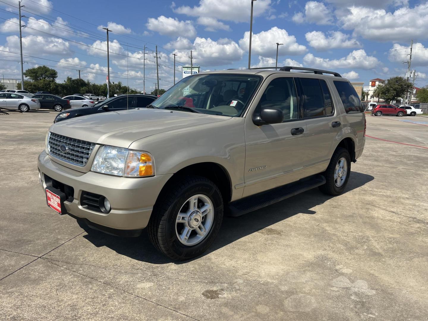 2004 GOLD Ford Explorer XLT 4.0L 2WD (1FMZU63K34U) with an 4.0L V6 SOHC 12V FFV engine, 5-Speed Automatic Overdrive transmission, located at 14700 Tomball Parkway 249, Houston, TX, 77086, (281) 444-2200, 29.928619, -95.504074 - Photo#2