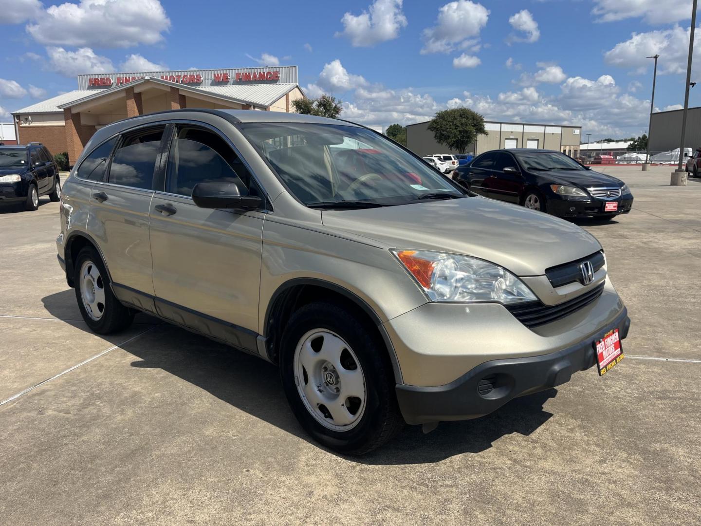 2009 GOLD Honda CR-V LX 2WD 5-Speed AT (3CZRE38339G) with an 2.4L L4 DOHC 16V engine, 5-Speed Automatic transmission, located at 14700 Tomball Parkway 249, Houston, TX, 77086, (281) 444-2200, 29.928619, -95.504074 - Photo#0
