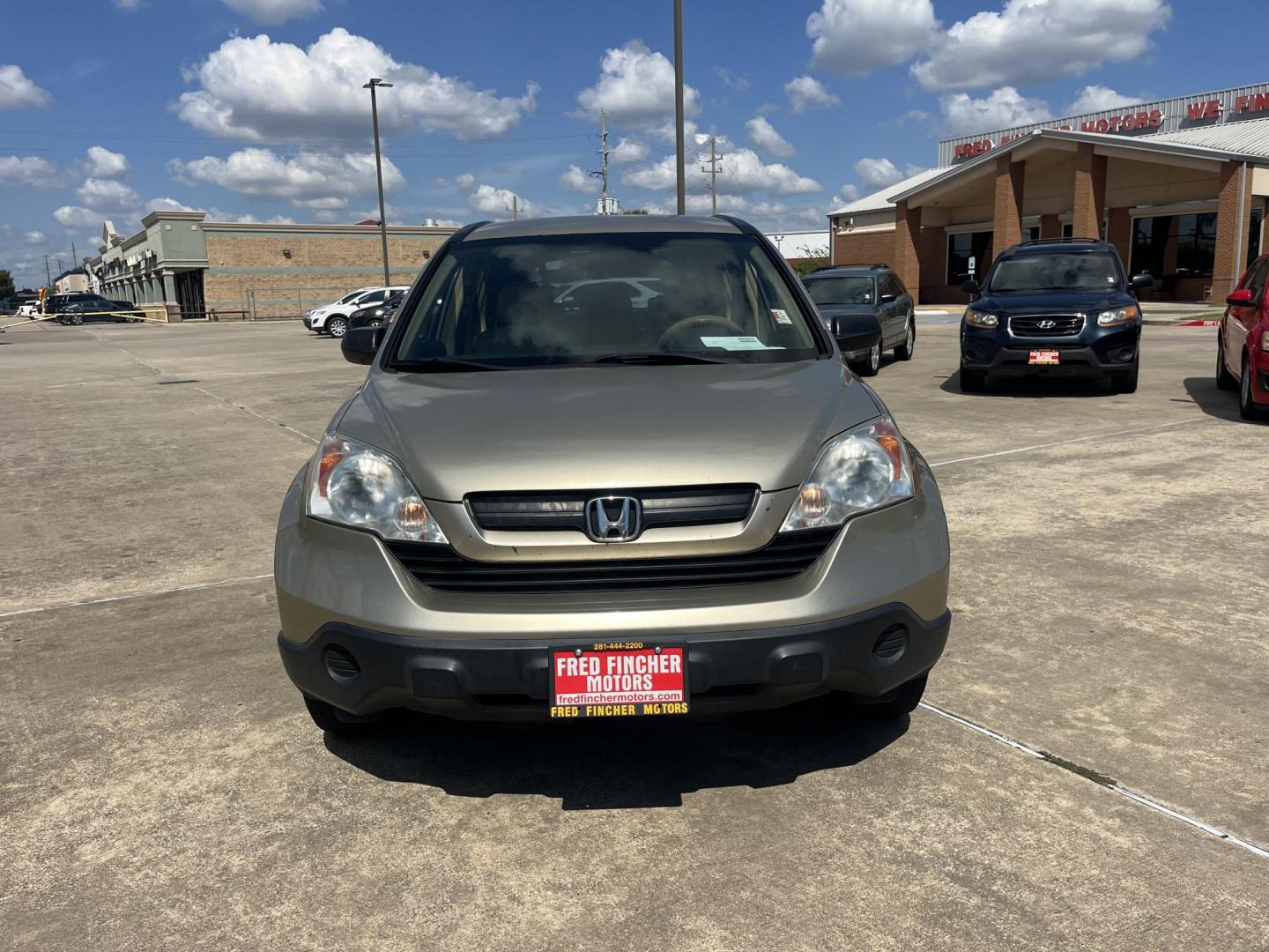 2009 GOLD Honda CR-V LX 2WD 5-Speed AT (3CZRE38339G) with an 2.4L L4 DOHC 16V engine, 5-Speed Automatic transmission, located at 14700 Tomball Parkway 249, Houston, TX, 77086, (281) 444-2200, 29.928619, -95.504074 - Photo#1