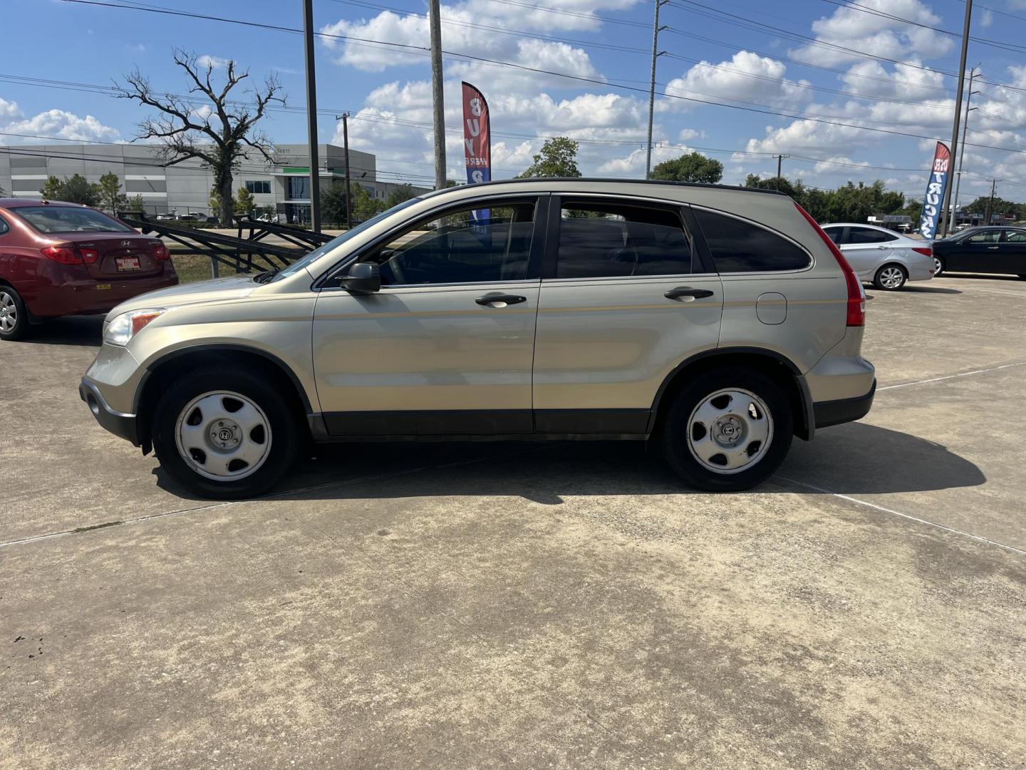 2009 GOLD Honda CR-V LX 2WD 5-Speed AT (3CZRE38339G) with an 2.4L L4 DOHC 16V engine, 5-Speed Automatic transmission, located at 14700 Tomball Parkway 249, Houston, TX, 77086, (281) 444-2200, 29.928619, -95.504074 - Photo#3