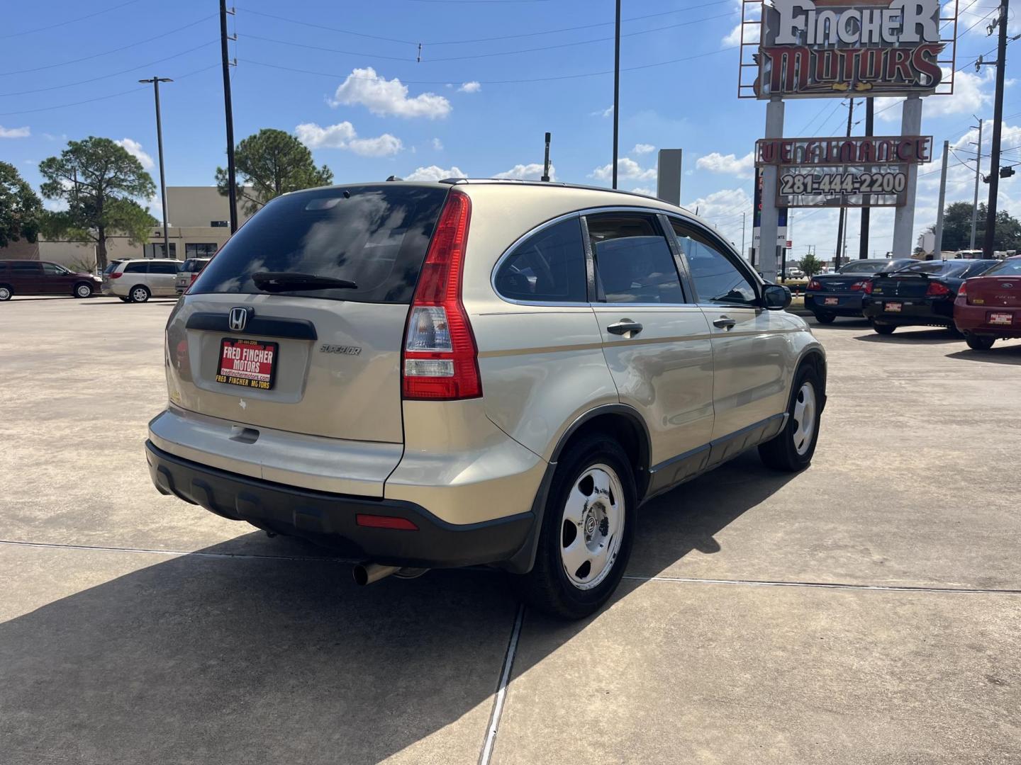 2009 GOLD Honda CR-V LX 2WD 5-Speed AT (3CZRE38339G) with an 2.4L L4 DOHC 16V engine, 5-Speed Automatic transmission, located at 14700 Tomball Parkway 249, Houston, TX, 77086, (281) 444-2200, 29.928619, -95.504074 - Photo#6