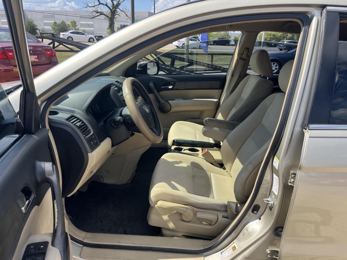 2009 GOLD Honda CR-V LX 2WD 5-Speed AT (3CZRE38339G) with an 2.4L L4 DOHC 16V engine, 5-Speed Automatic transmission, located at 14700 Tomball Parkway 249, Houston, TX, 77086, (281) 444-2200, 29.928619, -95.504074 - Photo#8