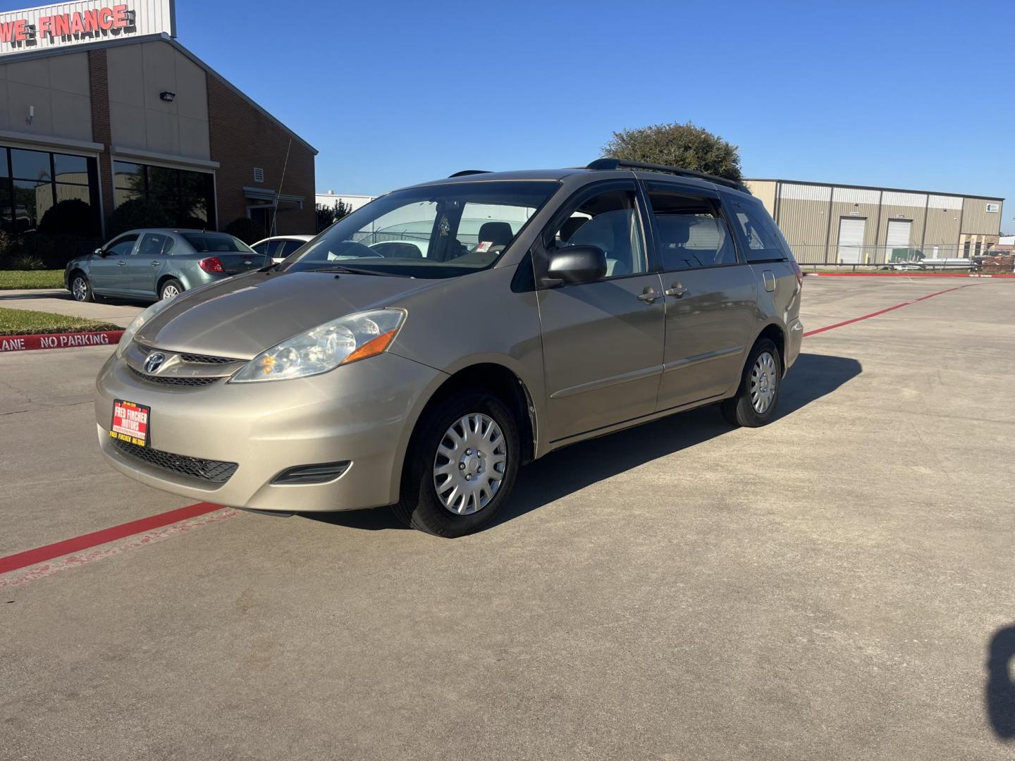 2007 GOLD Toyota Sienna CE FWD 7-Passenger Seating (5TDZK23C97S) with an 3.5L V6 EFI DOHC 24V engine, 5-Speed Automatic Overdrive transmission, located at 14700 Tomball Parkway 249, Houston, TX, 77086, (281) 444-2200, 29.928619, -95.504074 - Photo#2