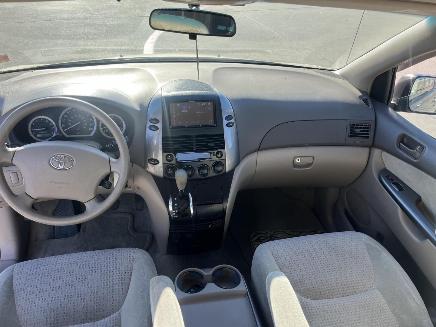 2007 GOLD Toyota Sienna CE FWD 7-Passenger Seating (5TDZK23C97S) with an 3.5L V6 EFI DOHC 24V engine, 5-Speed Automatic Overdrive transmission, located at 14700 Tomball Parkway 249, Houston, TX, 77086, (281) 444-2200, 29.928619, -95.504074 - Photo#9