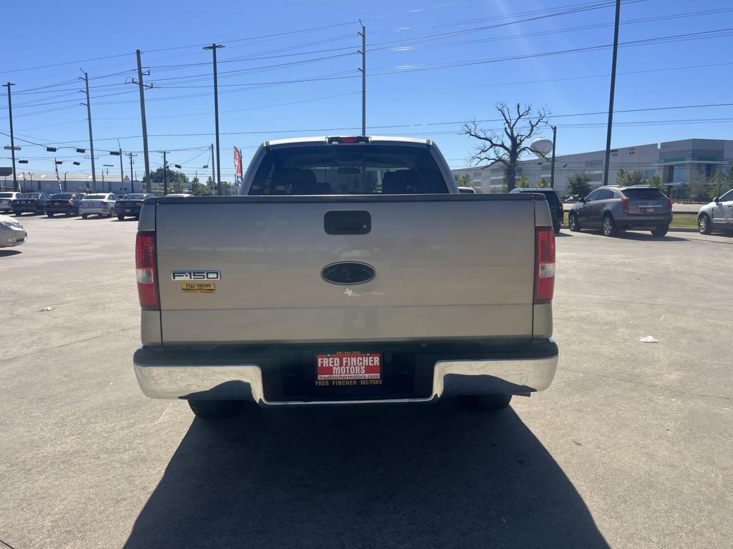 2006 GOLD Ford F-150 Lariat SuperCrew 2WD (1FTRW12W16F) with an 4.6L V8 SOHC 16V engine, 4-Speed Automatic Overdrive transmission, located at 14700 Tomball Parkway 249, Houston, TX, 77086, (281) 444-2200, 29.928619, -95.504074 - Photo#5