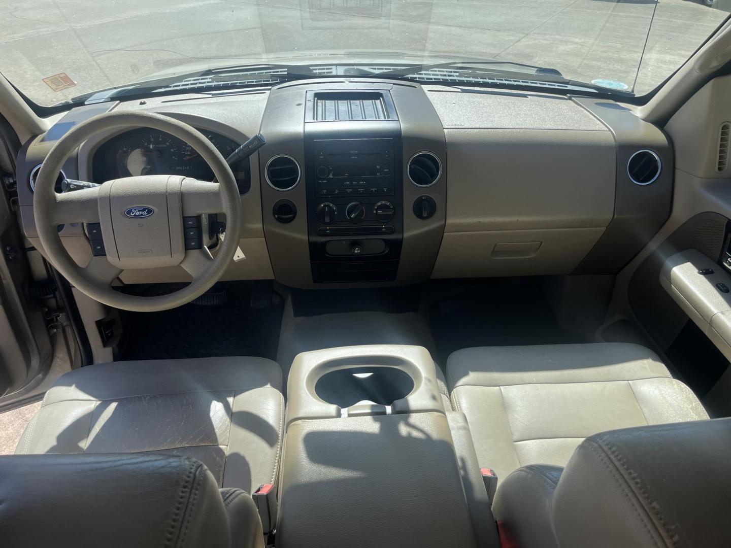 2006 GOLD Ford F-150 Lariat SuperCrew 2WD (1FTRW12W16F) with an 4.6L V8 SOHC 16V engine, 4-Speed Automatic Overdrive transmission, located at 14700 Tomball Parkway 249, Houston, TX, 77086, (281) 444-2200, 29.928619, -95.504074 - Photo#10