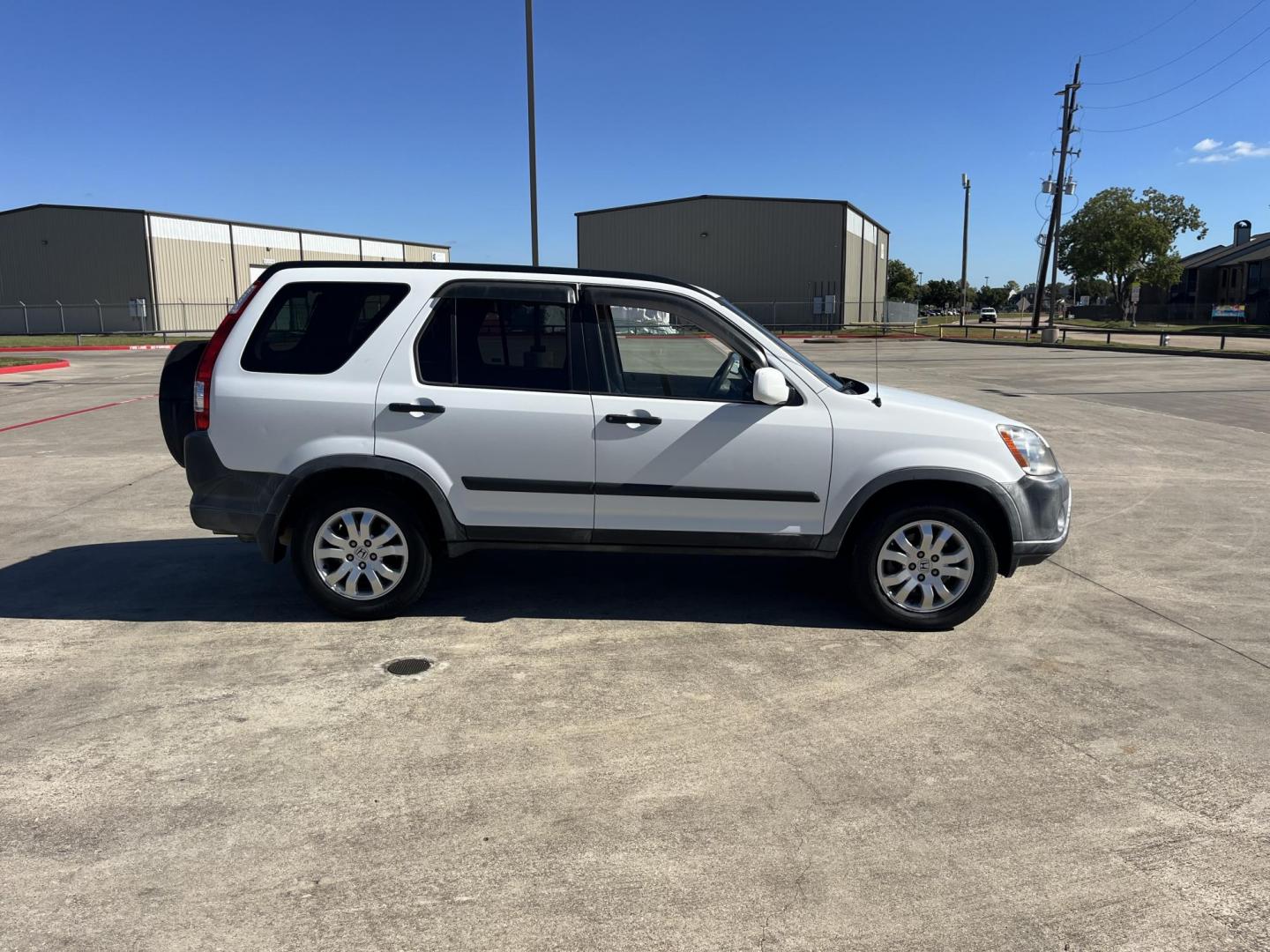 2006 Honda CR-V EX 4WD AT (JHLRD788X6C) with an 2.4L L4 DOHC 16V engine, 5-Speed Automatic Overdrive transmission, located at 14700 Tomball Parkway 249, Houston, TX, 77086, (281) 444-2200, 29.928619, -95.504074 - Photo#7