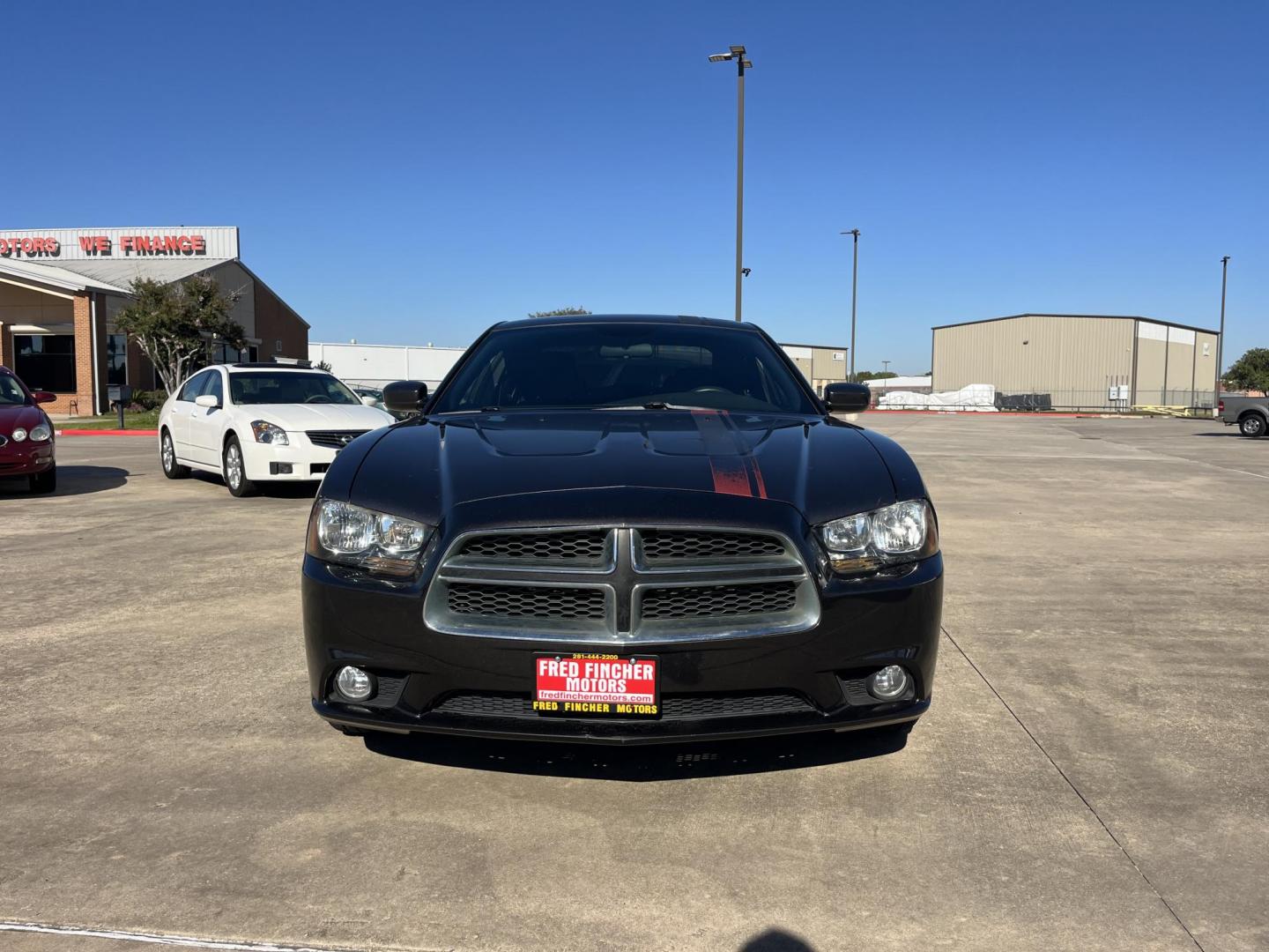2014 Dodge Charger SE (2C3CDXBG6EH) with an 3.6L V6 DOHC 24V engine, 5-Speed Automatic transmission, located at 14700 Tomball Parkway 249, Houston, TX, 77086, (281) 444-2200, 29.928619, -95.504074 - Photo#1