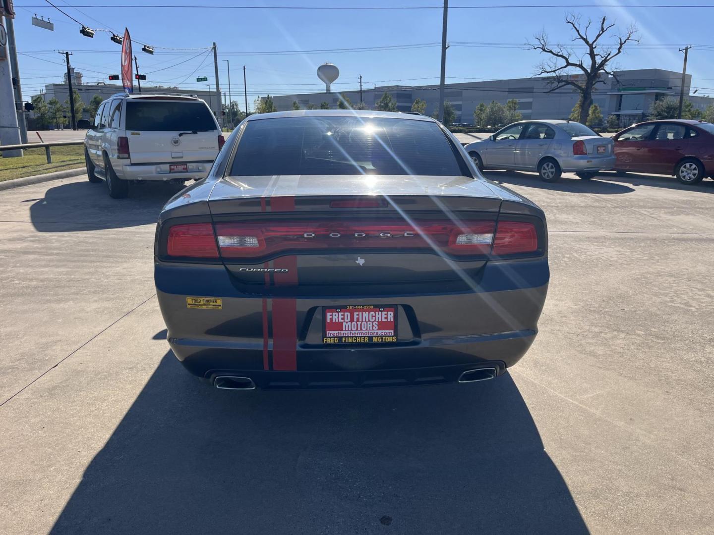 2014 Dodge Charger SE (2C3CDXBG6EH) with an 3.6L V6 DOHC 24V engine, 5-Speed Automatic transmission, located at 14700 Tomball Parkway 249, Houston, TX, 77086, (281) 444-2200, 29.928619, -95.504074 - Photo#5