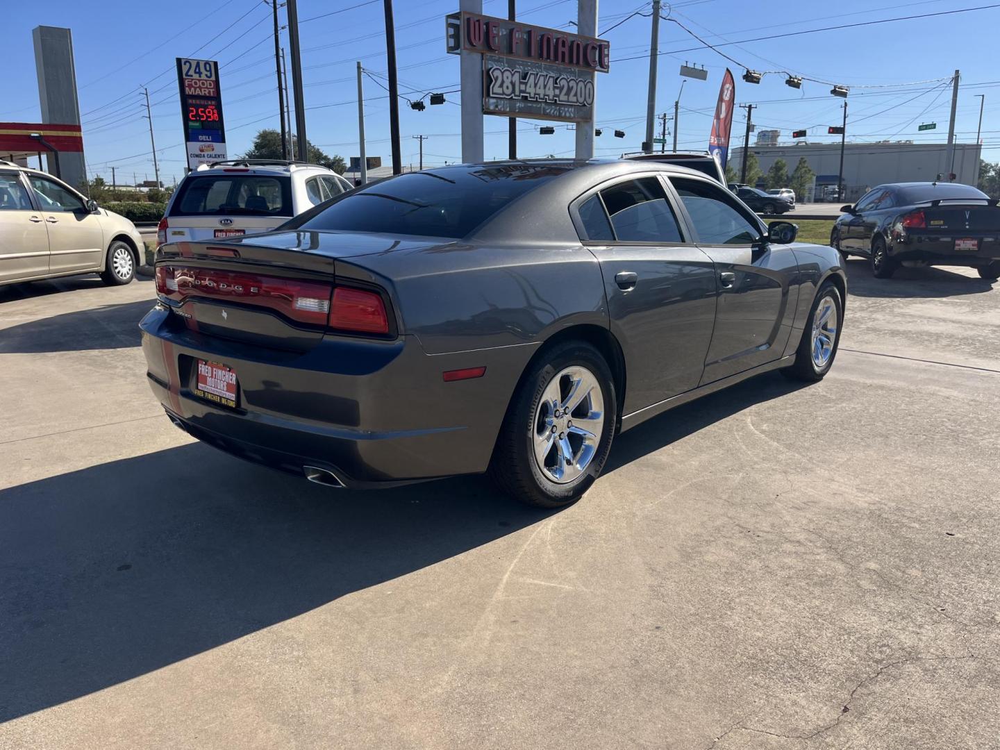 2014 Dodge Charger SE (2C3CDXBG6EH) with an 3.6L V6 DOHC 24V engine, 5-Speed Automatic transmission, located at 14700 Tomball Parkway 249, Houston, TX, 77086, (281) 444-2200, 29.928619, -95.504074 - Photo#6