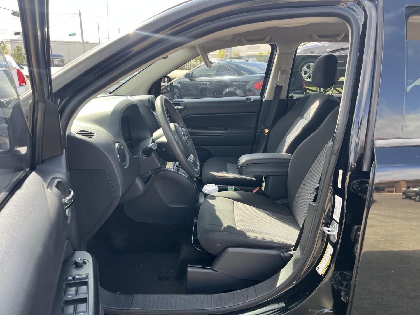 2014 black Jeep Compass Sport FWD (1C4NJCBAXED) with an 2.0L L4 DOHC 16V engine, located at 14700 Tomball Parkway 249, Houston, TX, 77086, (281) 444-2200, 29.928619, -95.504074 - Photo#8