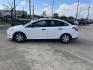 2014 white Ford Focus S Sedan (1FADP3E22EL) with an 2.0L L4 DOHC 16V engine, located at 14700 Tomball Parkway 249, Houston, TX, 77086, (281) 444-2200, 29.928619, -95.504074 - Photo#3
