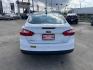 2014 white Ford Focus S Sedan (1FADP3E22EL) with an 2.0L L4 DOHC 16V engine, located at 14700 Tomball Parkway 249, Houston, TX, 77086, (281) 444-2200, 29.928619, -95.504074 - Photo#5