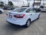 2014 white Ford Focus S Sedan (1FADP3E22EL) with an 2.0L L4 DOHC 16V engine, located at 14700 Tomball Parkway 249, Houston, TX, 77086, (281) 444-2200, 29.928619, -95.504074 - Photo#6