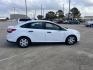 2014 white Ford Focus S Sedan (1FADP3E22EL) with an 2.0L L4 DOHC 16V engine, located at 14700 Tomball Parkway 249, Houston, TX, 77086, (281) 444-2200, 29.928619, -95.504074 - Photo#7