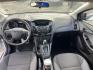 2014 white Ford Focus S Sedan (1FADP3E22EL) with an 2.0L L4 DOHC 16V engine, located at 14700 Tomball Parkway 249, Houston, TX, 77086, (281) 444-2200, 29.928619, -95.504074 - Photo#10