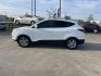 2012 white Hyundai Tucson Limited 2WD (KM8JU3ACXCU) with an 2.4L L4 DOHC 16V engine, 6-Speed Automatic transmission, located at 14700 Tomball Parkway 249, Houston, TX, 77086, (281) 444-2200, 29.928619, -95.504074 - Photo#3
