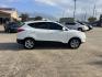 2012 white Hyundai Tucson Limited 2WD (KM8JU3ACXCU) with an 2.4L L4 DOHC 16V engine, 6-Speed Automatic transmission, located at 14700 Tomball Parkway 249, Houston, TX, 77086, (281) 444-2200, 29.928619, -95.504074 - Photo#7