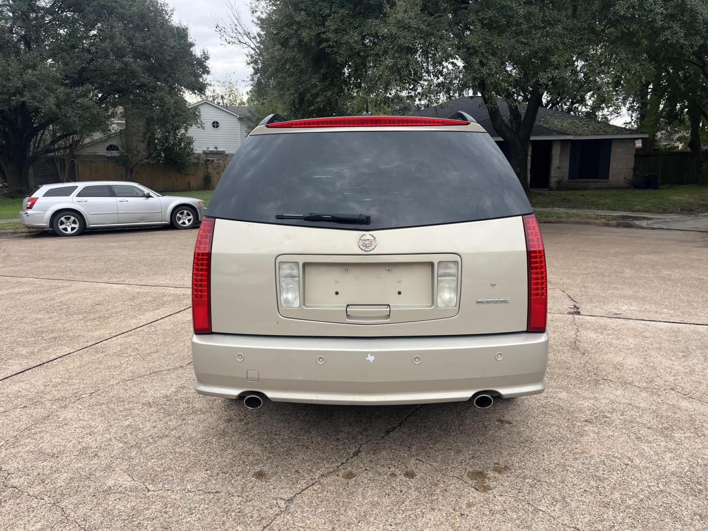 2008 GOLD Cadillac SRX V6 (1GYEE637980) with an 3.6L V6 OHV 24V engine, 5-Speed Automatic Overdrive transmission, located at 14700 Tomball Parkway 249, Houston, TX, 77086, (281) 444-2200, 29.928619, -95.504074 - Photo#4